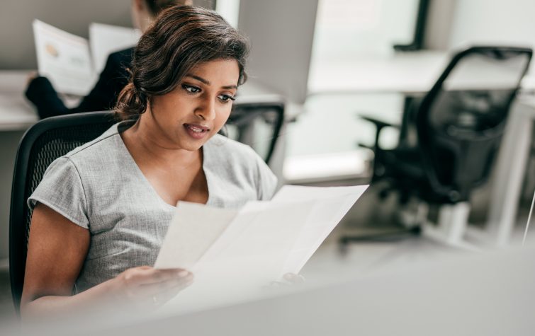 Businesswoman working at her desk