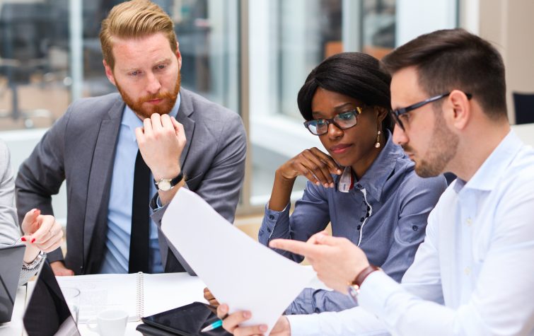 Group of business people is working on business strategy