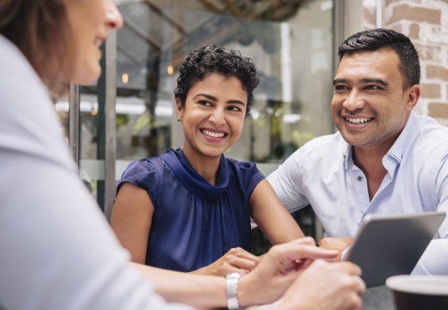 Smiling mature couple get good advice