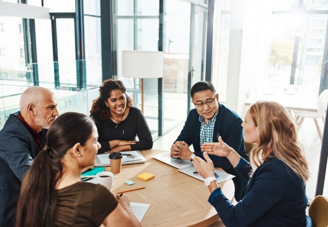 Shot of a group of businesspeople having a meeting in an office