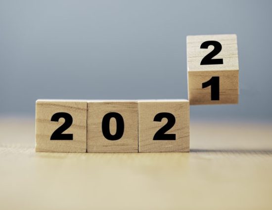 Flipping of wooden block for change from 2021 to 2022