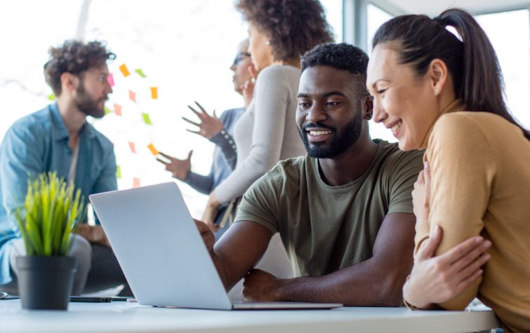 Young diverse coworkers meeting in the office