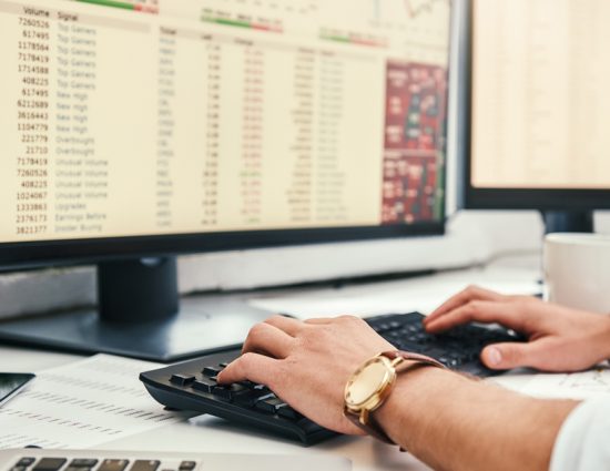 Man reviewing analytics on computer