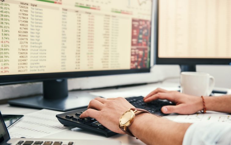 Man reviewing analytics on computer