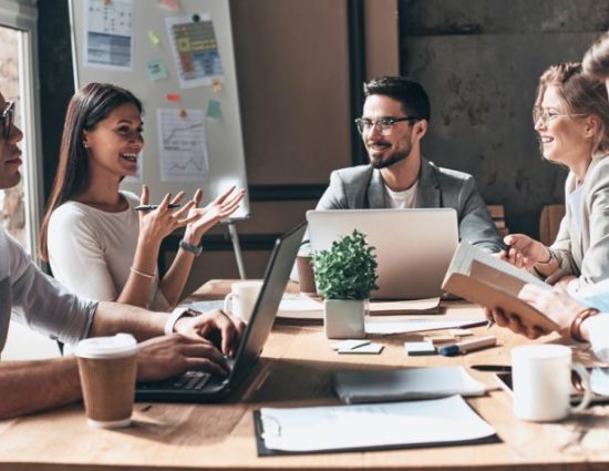 work team in a meeting in a conference room