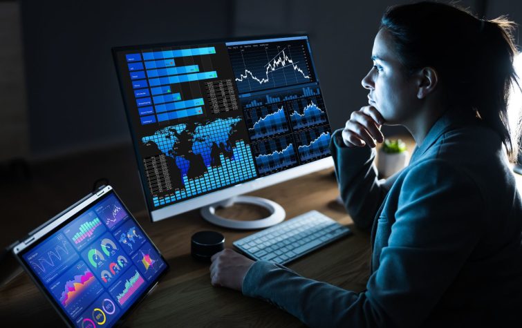 Global mobility professional monitoring employee data security and compliance analytics
