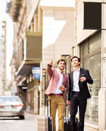 Two professionals navigating a new city during an international work assignment in Latin America
