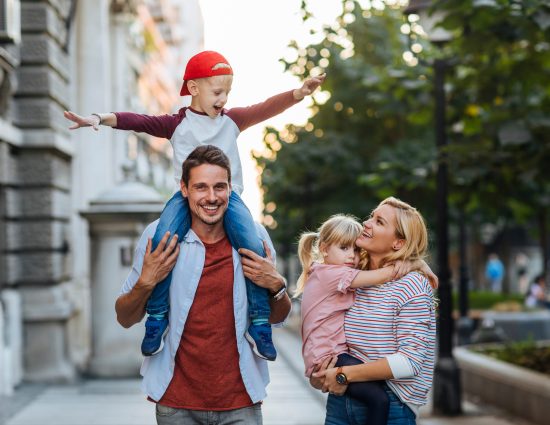 Family with young child enjoying a city destination representing the importance of destination fit in international relocation and global mobility assignments