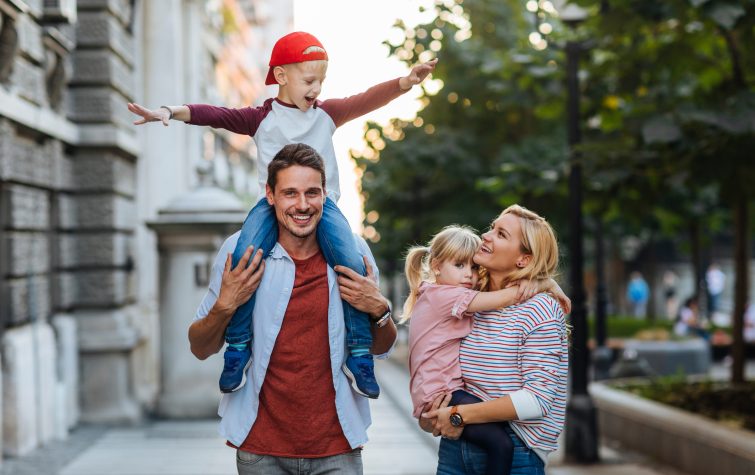 Family with young child enjoying a city destination representing the importance of destination fit in international relocation and global mobility assignments