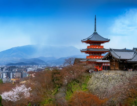 Traditional Japanese pagoda overlooking Kyoto, highlighting the destination for employee relocation to Japan