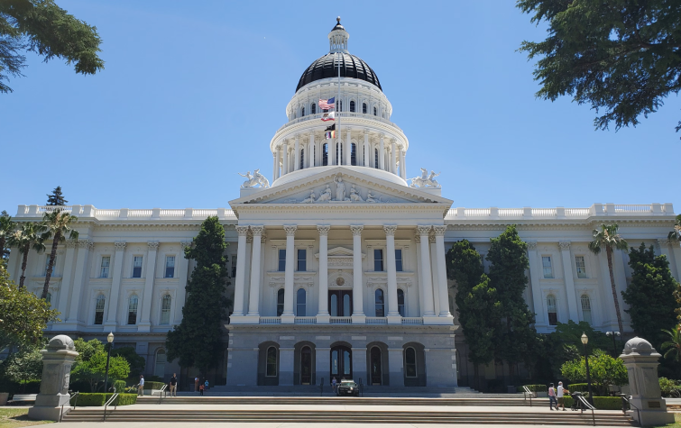 California State Capitol building representing AB 692 and AB 1697 legislation governing relocation repayment agreements and stay-or-pay provisions