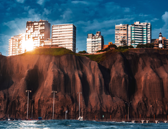 Apartment buildings above the coastal cliffs of Miraflores in Lima Peru representing temporary housing options for employees relocating internationally